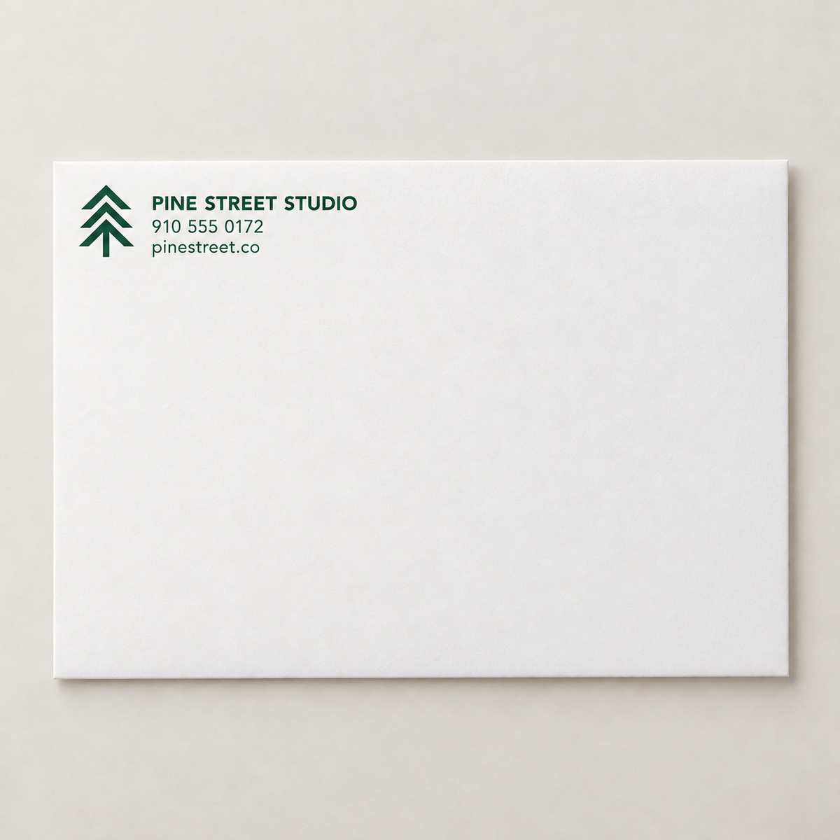 One-color A2 business announcement envelope with logo and contact information in the upper-left