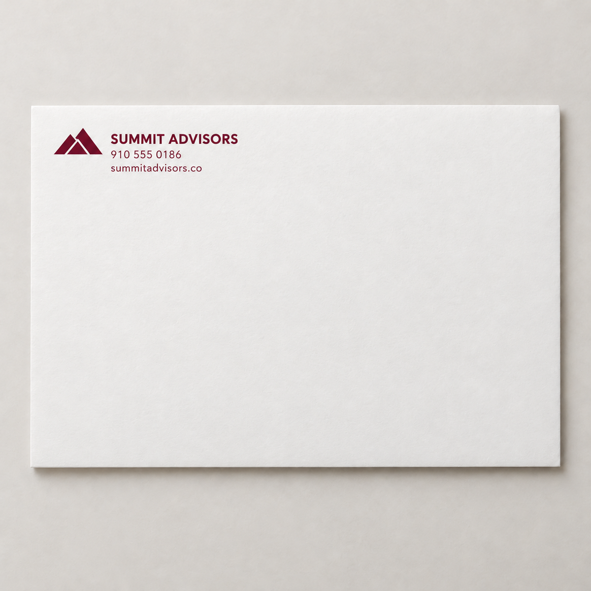 One-color A6 business announcement envelope with logo and contact information in the upper-left